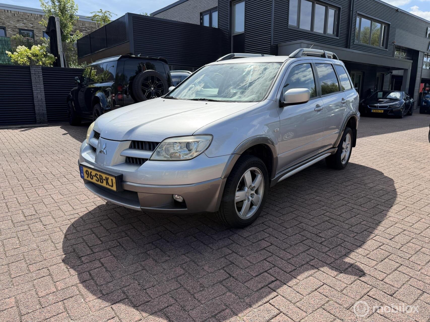 Mitsubishi Outlander 2.4 Intense 4WD Automaat Airco Trekh Na, Automaat, Stof, Zwart, 4 cilinders