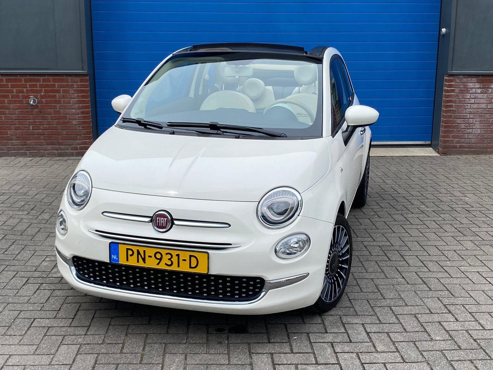 Fiat 500C 0.9 80pk Twinair Navi Cruise Bluetooth Nieuwe APK, Cabriolet, Leder en Stof, Wit, Origineel Nederlands