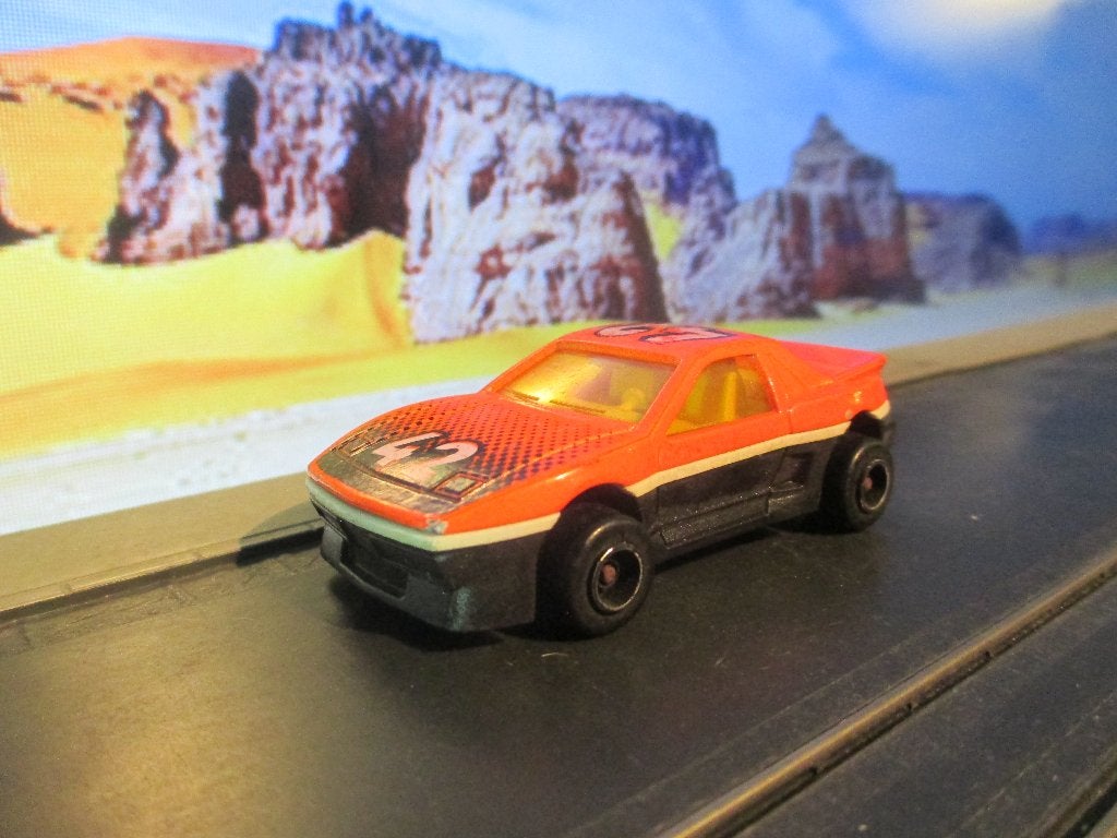 1:55 Pontiac Fiero - Majorette oranje/zwart, Ophalen of Verzenden, Gebruikt, Auto