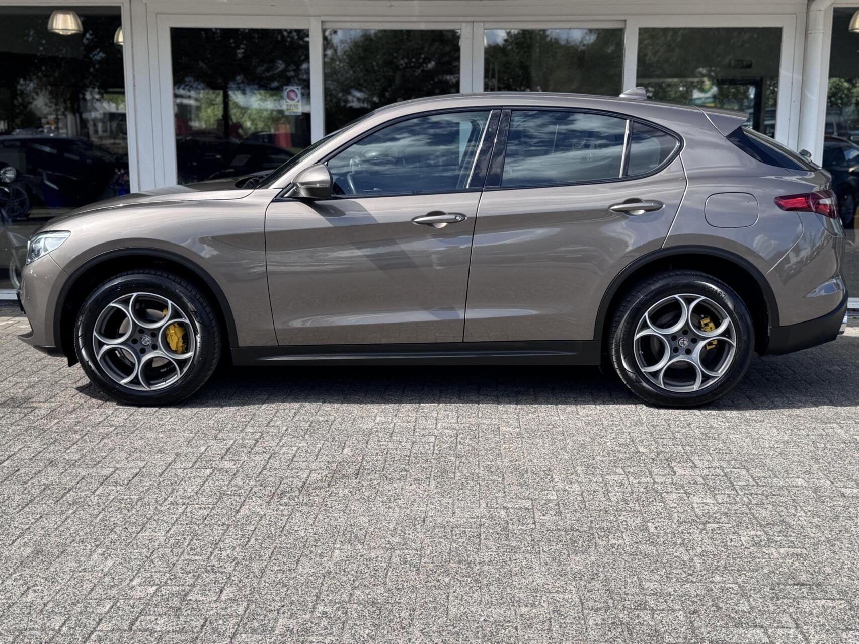 Alfa Romeo Stelvio 2.0 T 200pk Automaat AWD Super,Clima,Crui, Auto's, Automaat, Leder en Stof, Vierwielaandrijving, 1600 kg