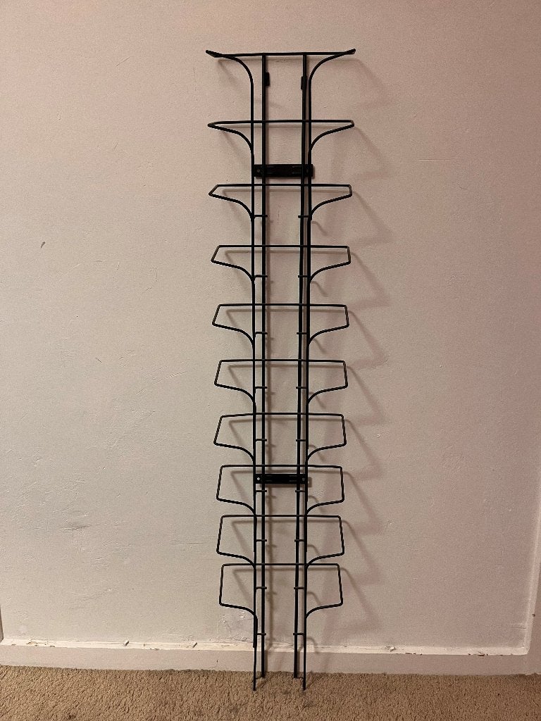 Tienvaks tijdschriftenrek / folderrek, Ophalen