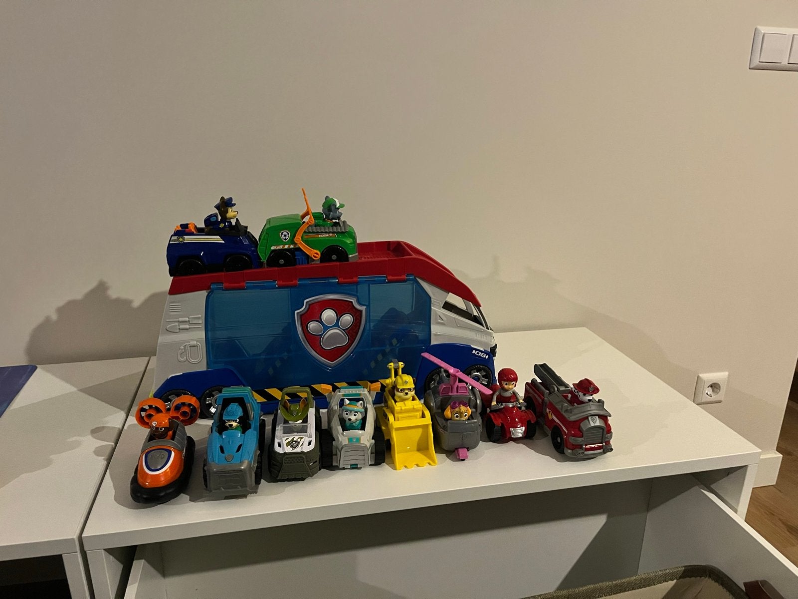 Paw Patrol Patroller transformer met 9 voertuigen en figuren, Ophalen of Verzenden, Zo goed als nieuw