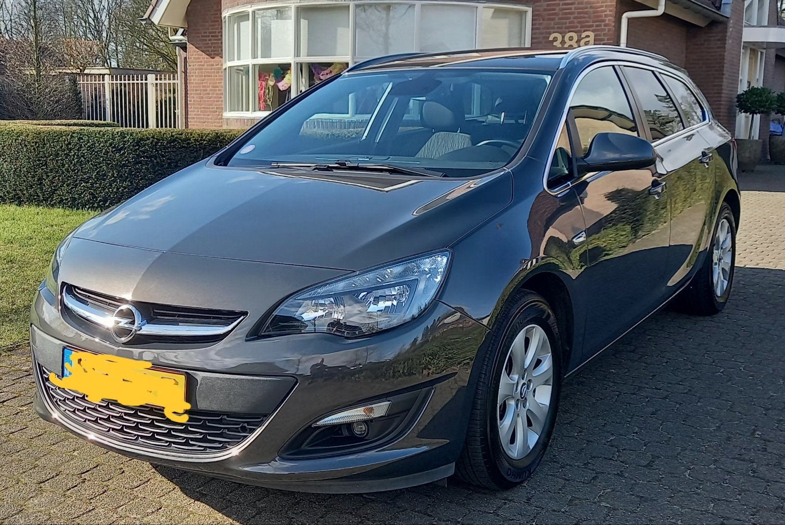 Opel Astra 1.4 Turbo 88KW ST 2015 Grijs, Auto's, Opel, Voorwielaandrijving, 4 cilinders, Origineel Nederlands, Handgeschakeld