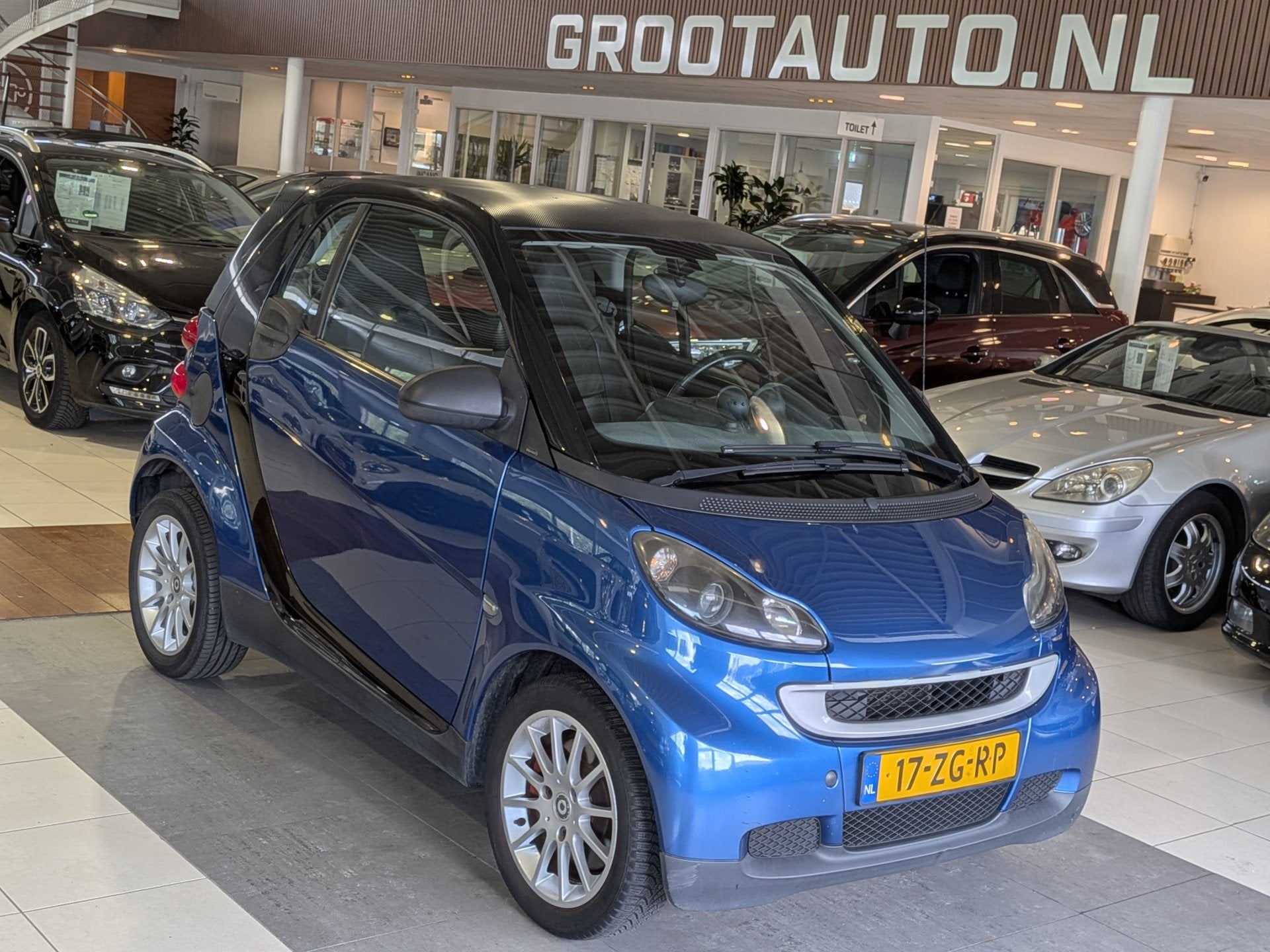 Smart Fortwo Coupé 1.0 Pure Automaat Airco, Stuurbekrachtig, Auto's, Achterwielaandrijving, Zwart, 18 €/maand, Blauw