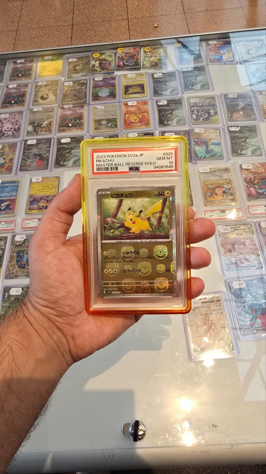 Pikachu Masterball Reverse Holo #025 | PSA 10, Hobby en Vrije tijd, Ophalen of Verzenden, Zo goed als nieuw