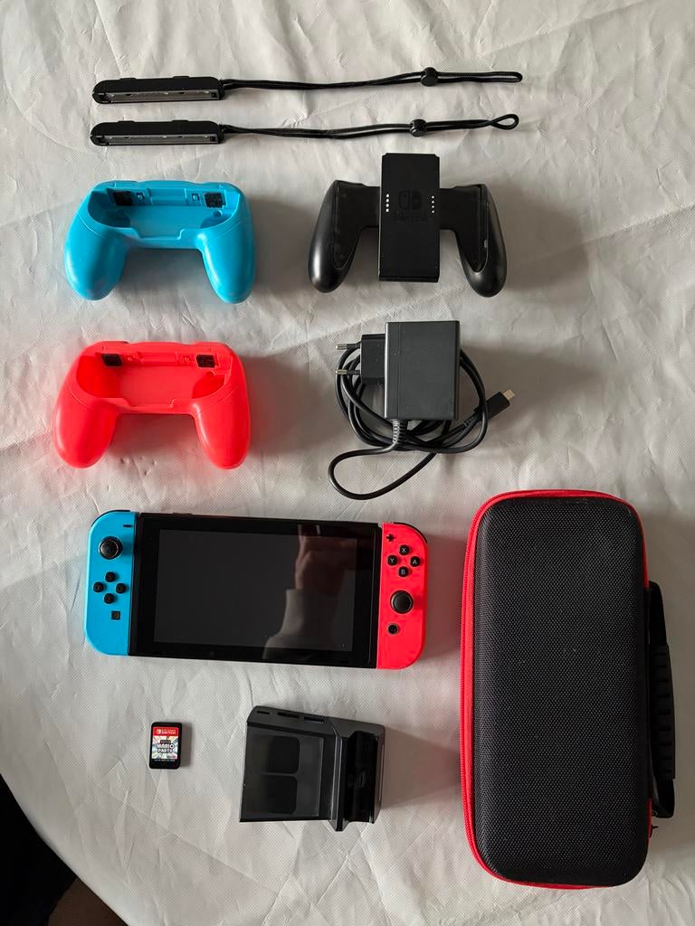 Nintendo Switch (V1) blauw/rood, Spelcomputers en Games, Met games, Met 2 controllers, Ophalen of Verzenden, Zo goed als nieuw