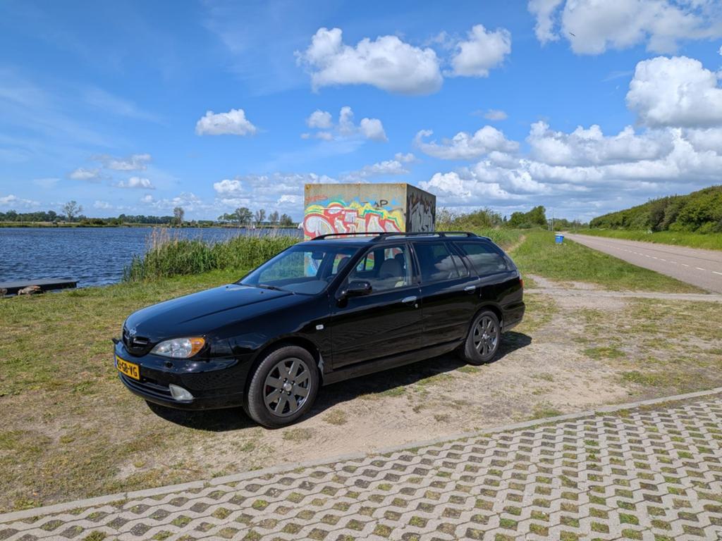 Nissan Primera 2.0 Estate 2000 Zwart, Auto's, Voorwielaandrijving, 1998 cc, 1275 kg, 4 cilinders