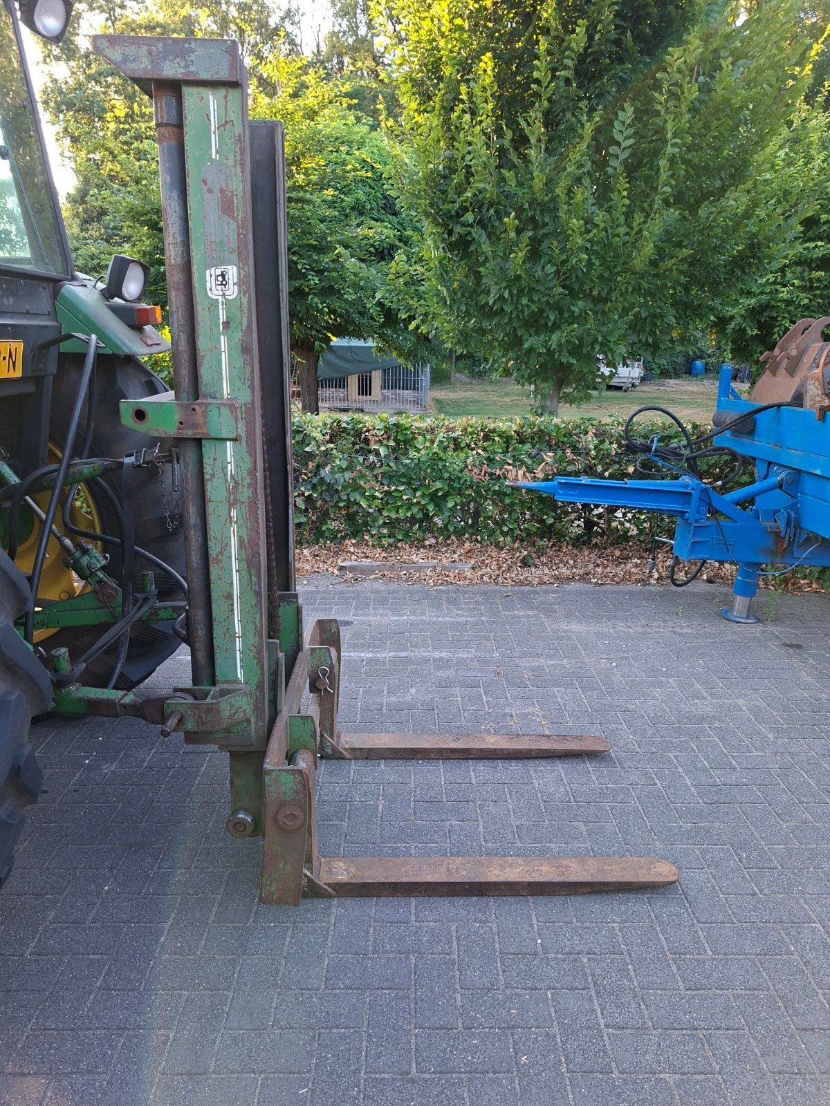 Tractor hefmast met lepels, Zakelijke goederen, Ophalen