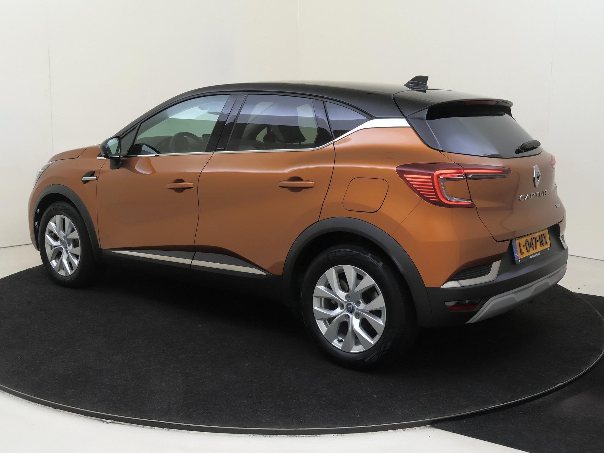 Renault Captur 1.6 E-Tech Plug-in Hybrid 160 Intens Groot sc, Auto's, Renault, Stof, Gebruikt, Hybride Elektrisch/Benzine, 71 km/l