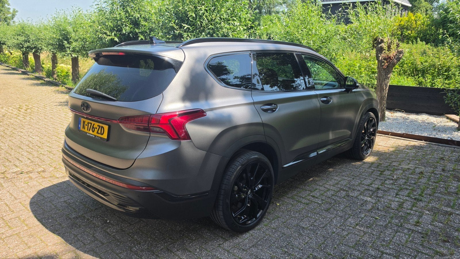 Hyundai Santa Fe 1.6 T-gdi HEV 230pk Aut. (7-zitter) 2021, Auto's, Hyundai, Zwart, 179 pk, SUV of Terreinwagen, 1598 cc