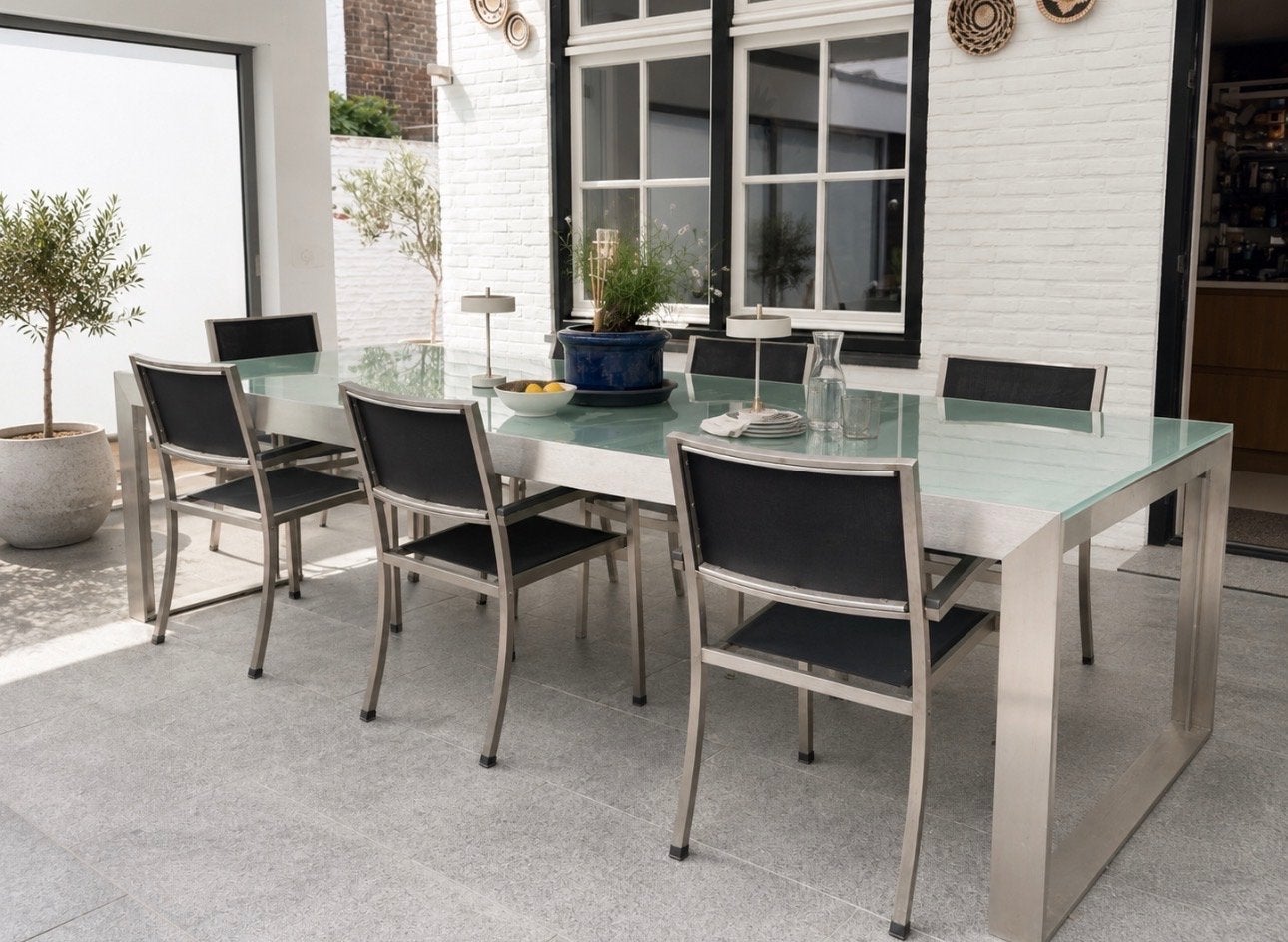 Luxe RVS Tuintafel met Glazen Blad en 6 Stoelen, Ophalen, Gebruikt, Eettafel, 6 zitplaatsen