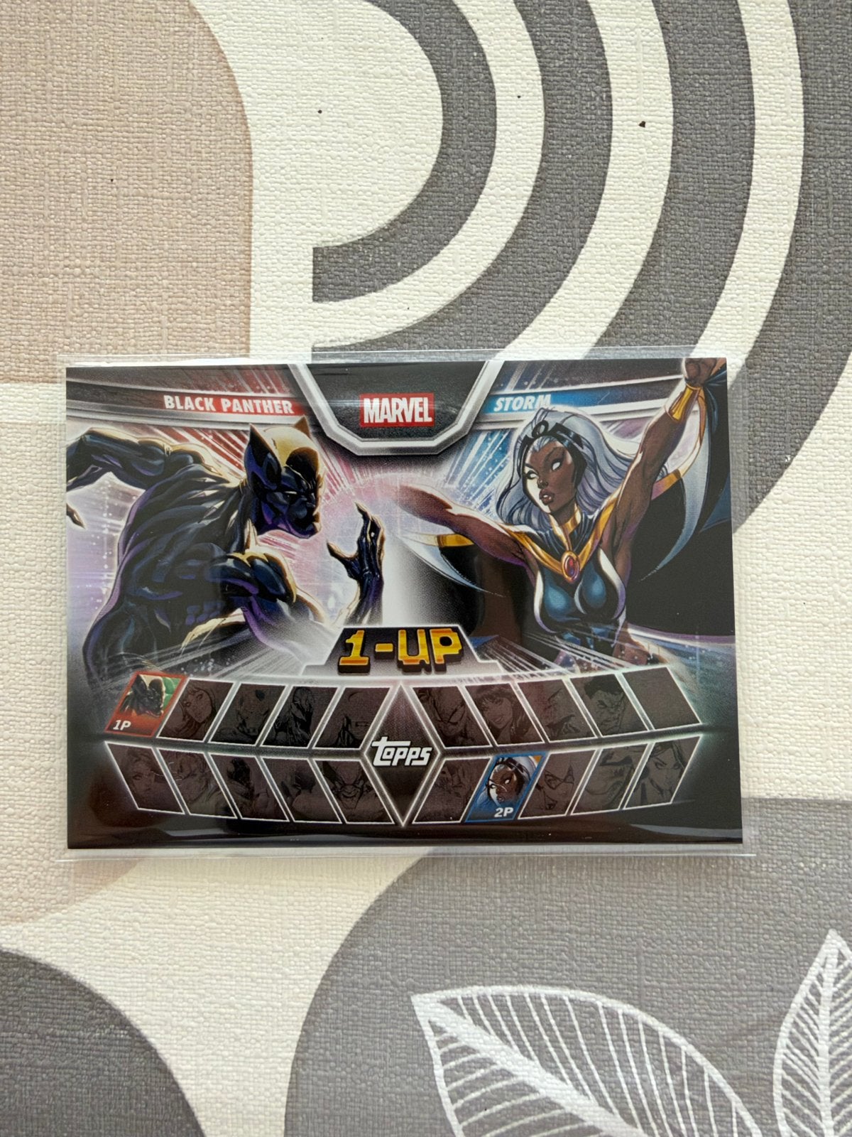 2026 Topps Marvel Case Hit Insert Black Panther&Storm #1UP-4, Ophalen of Verzenden, Zo goed als nieuw, Losse kaart