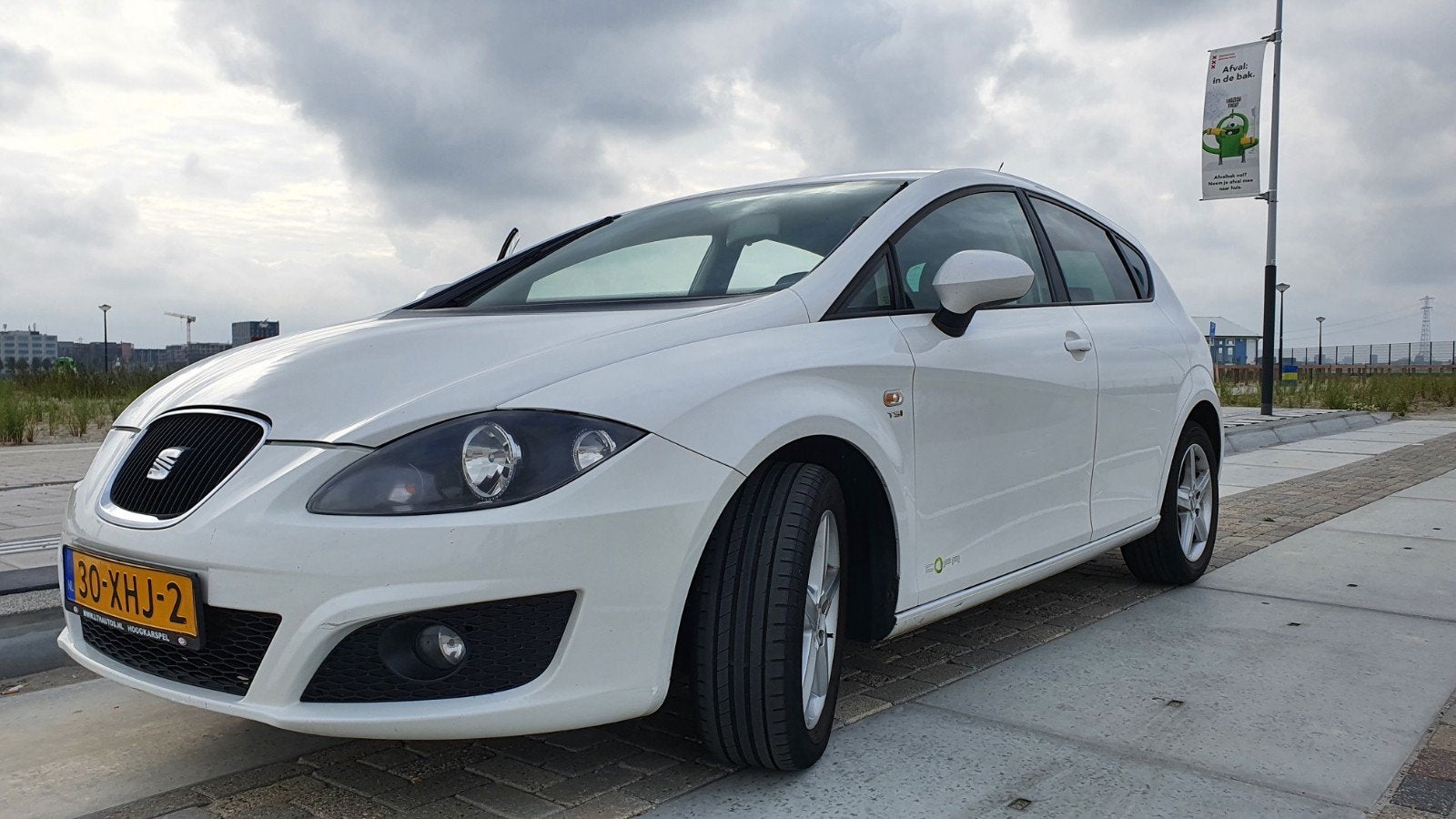 Seat Leon 1.2 TSI 77KW 2012 Wit, Auto's, Voorwielaandrijving, 4 cilinders, Leon, Wit