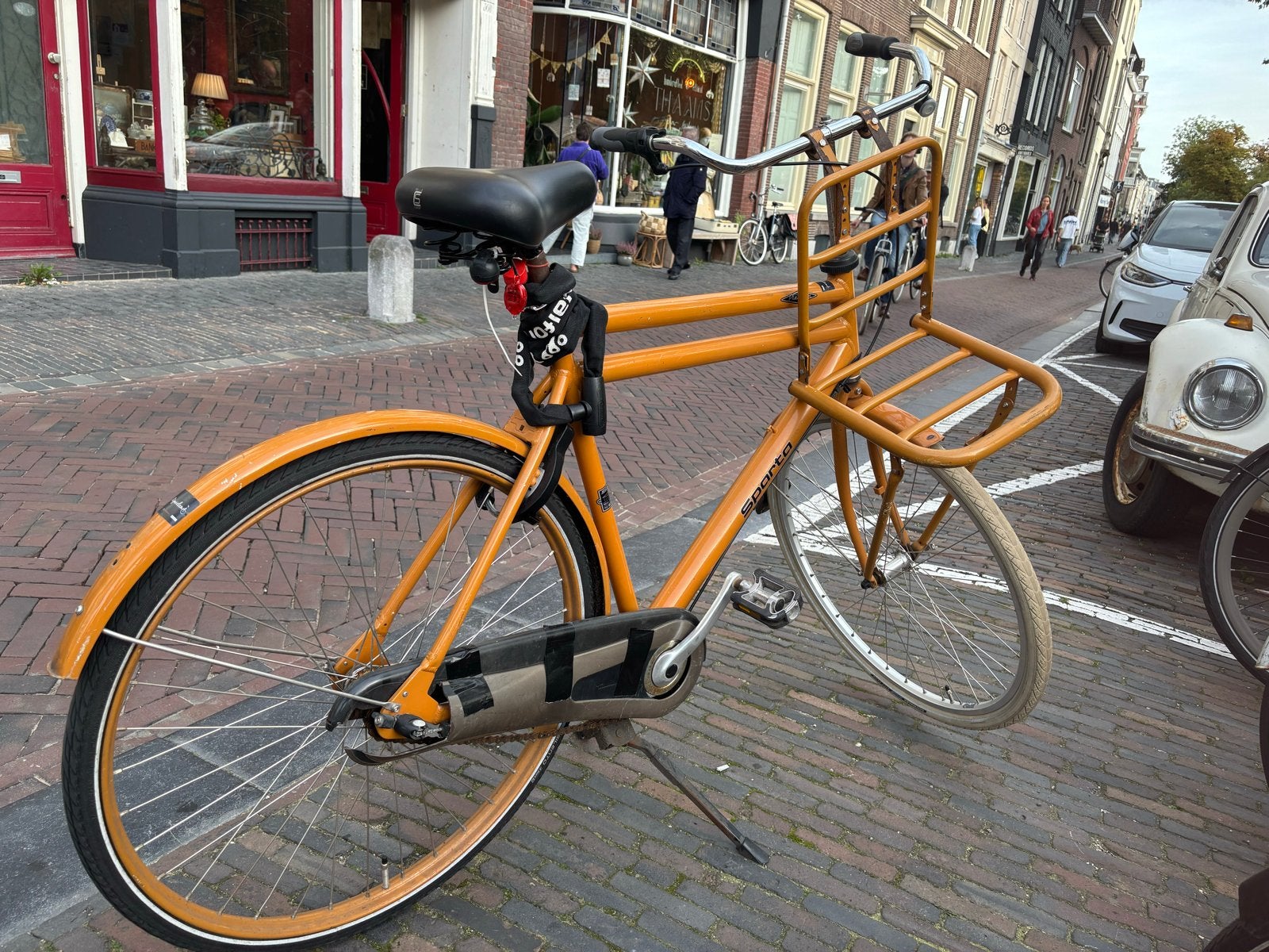 Oranje Sparta fiets met rekje, Fietsen en Brommers, Ophalen, Gebruikt, Sparta, Versnellingen