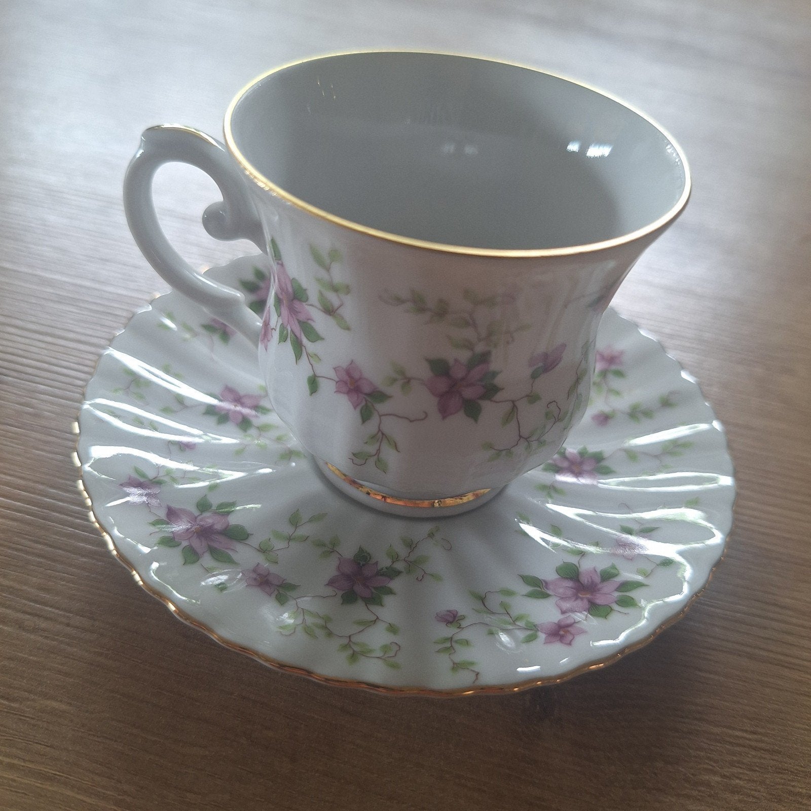 Vintage Royal China kop en schotel met bloemmotief, Antiek en Kunst, Ophalen of Verzenden