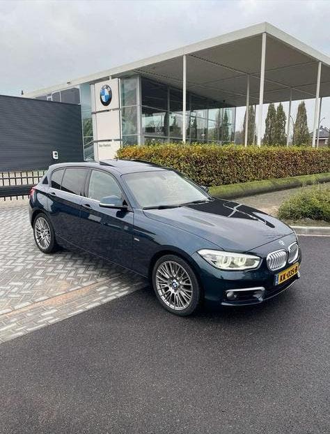 BMW 1-Serie 118i - Urban line, Auto's, BMW, 1295 kg, Blauw, Origineel Nederlands, 650 kg
