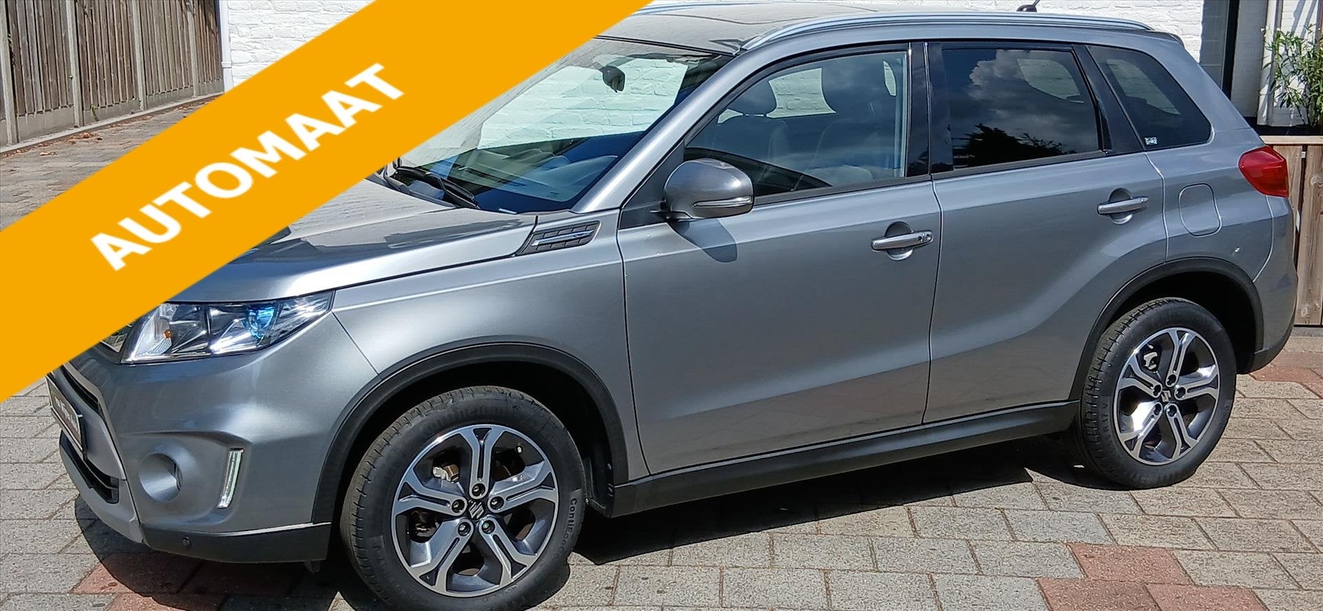 Suzuki Vitara 1.6 VVT automaat high Exclusive panorama 38000, Auto's, Automaat, Gebruikt, Zwart, 4 cilinders