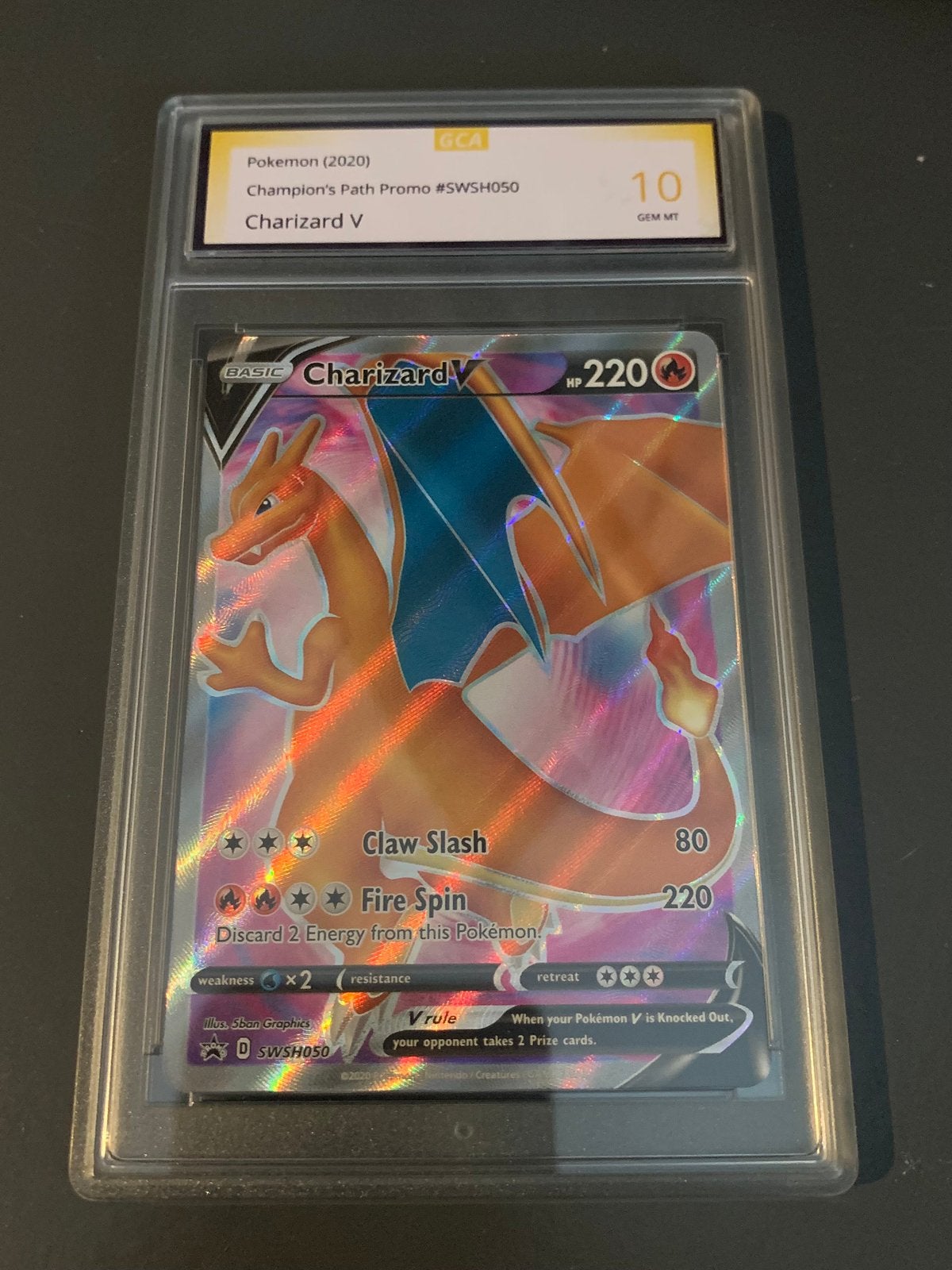 Charizard V (GCA 10) Champion’s Path Promo #SWSH050, Ophalen of Verzenden, Zo goed als nieuw