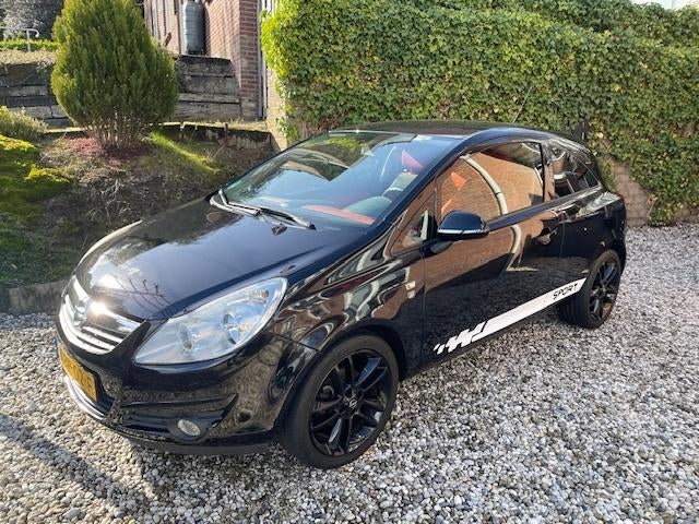 Opel Corsa 1.2  Special Edition "111" uitvoering 2010., Auto's, Voorwielaandrijving, 1229 cc, Zwart, Overige kleuren