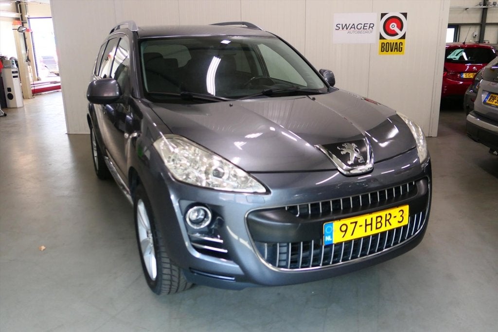 Peugeot 4007 2.4 16V 170pk CVT Aut.GT (7PERSOONS&TREKHAAK), Auto's, Gebruikt, 4 cilinders, 7 stoelen, Xenon verlichting