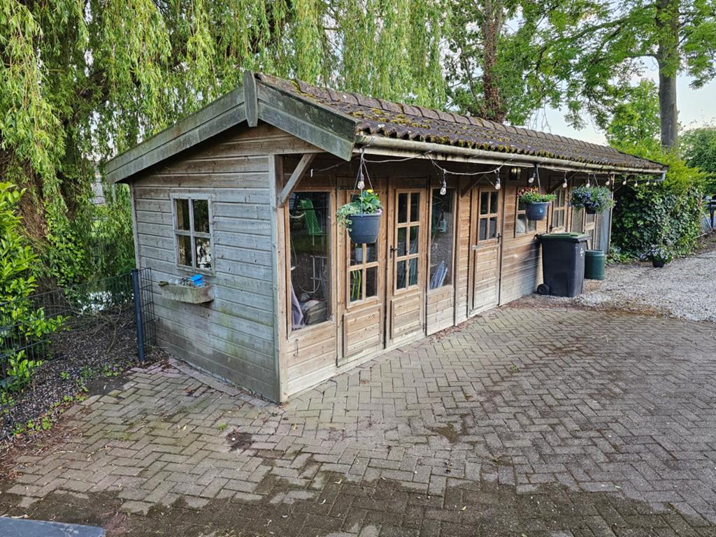 Groot tuinhuis met 4 ruimtes en dierenverblijf, Ophalen of Verzenden