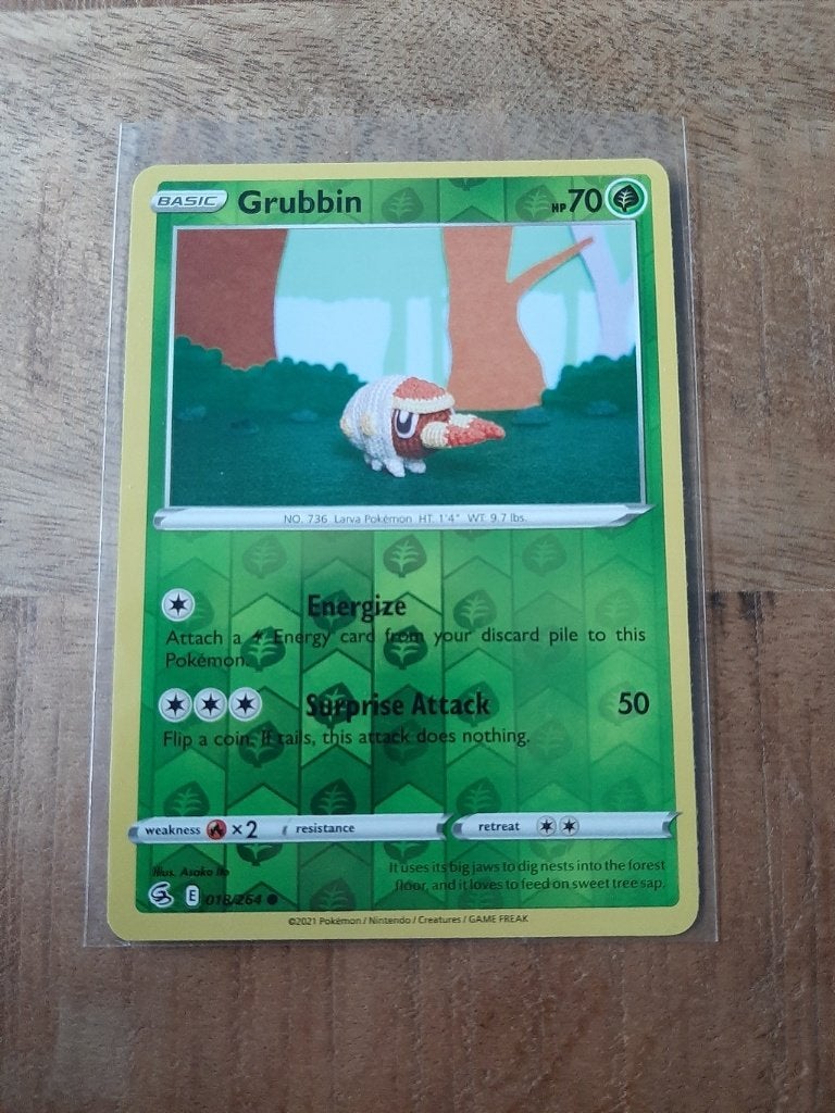 Grubbin #18, Reverse Holo, Pokemon Fusion Strike, Ophalen of Verzenden, Nieuw, Losse kaart