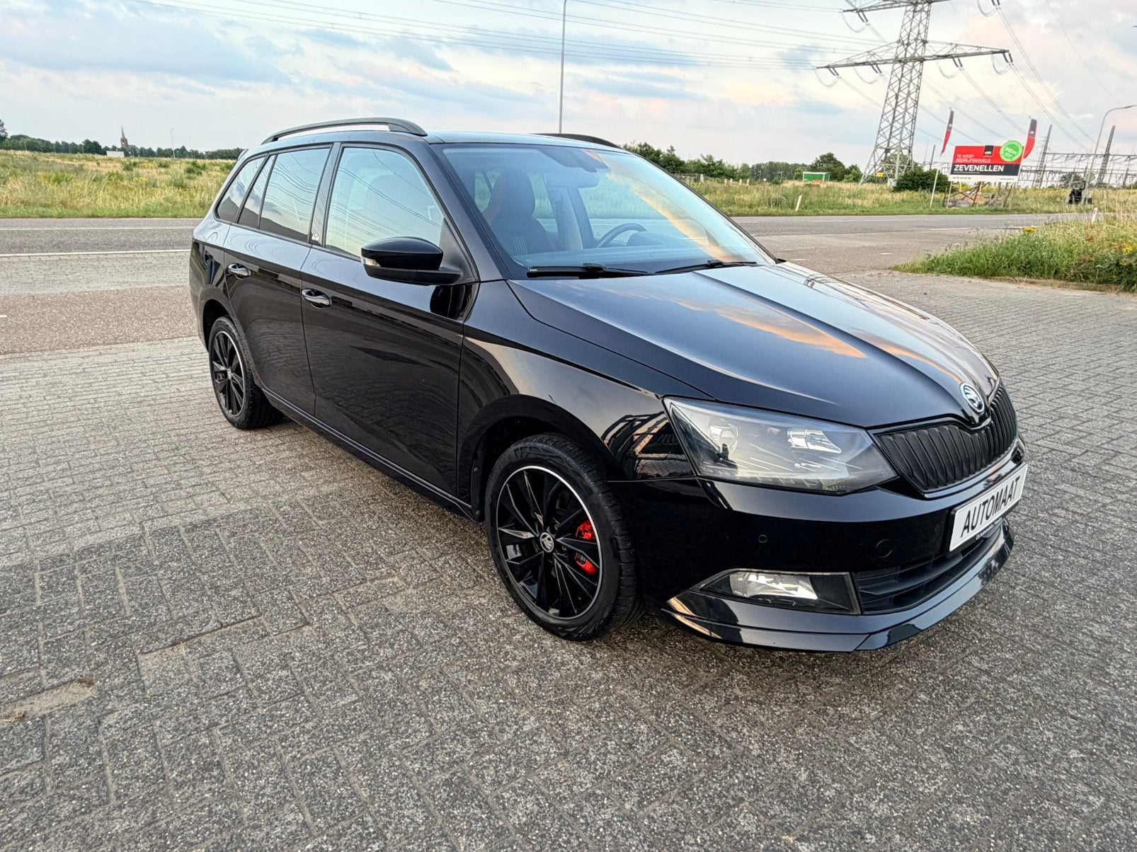 Skoda Fabia Combi 1.2 TSI Aut. Monte Carlo Panorama/Navi/PDC, Auto's, Stof, Zwart, 1100 kg, Fabia