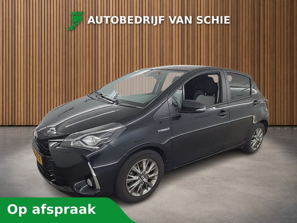 Toyota Yaris 1.5 Hybrid Dynamic 1e-Eig. & Keurig-Onderh BOVA, Auto's, 12 maanden, Gebruikt, 4 cilinders, Zwart