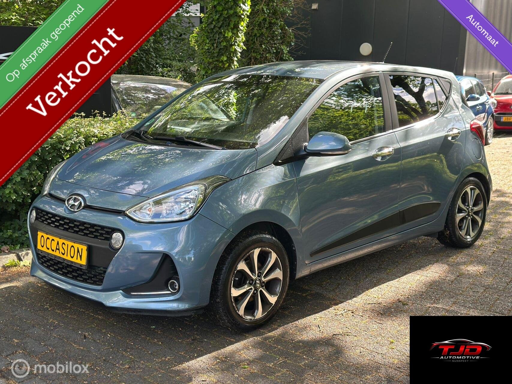 Hyundai I10 1.2i COMFORT-AUTOMAAT-CLIMA-STUURVERWARMING, Auto's, Stof, Gebruikt, Zwart, 4 cilinders