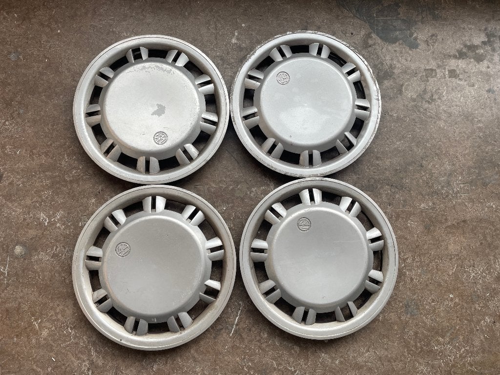 VW T4 wieldoppen – Multivan / Caravelle / Transporter, Ophalen of Verzenden, Voor, Volkswagen, Bumper