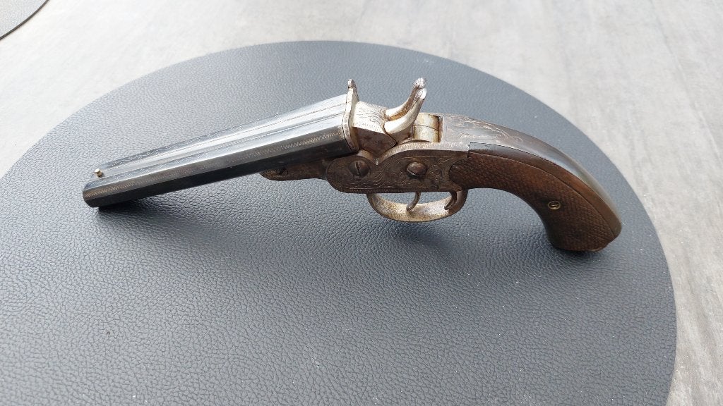 Antiek rolling block nagant dubbelloops pistool, Ophalen of Verzenden
