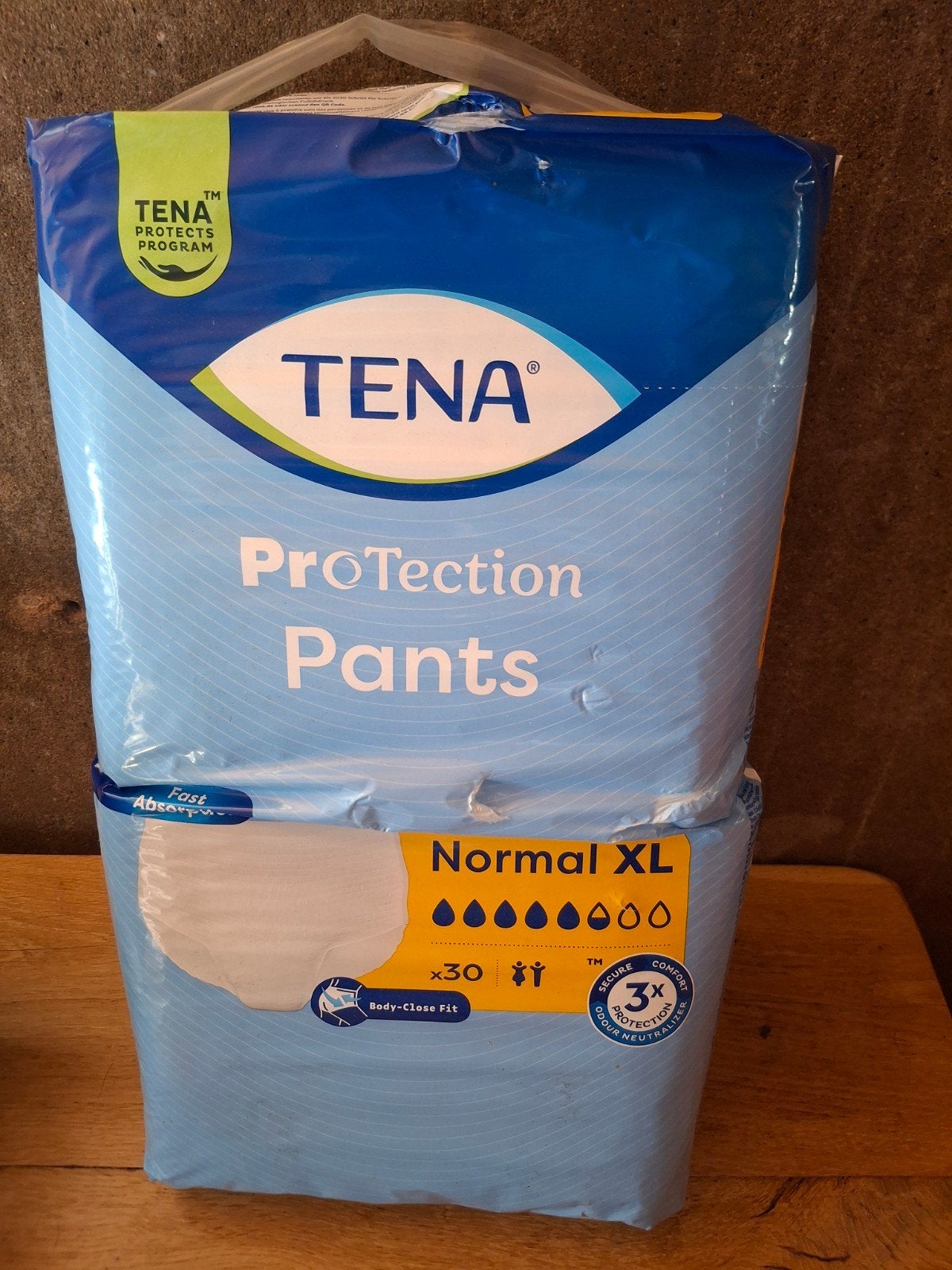 Tena Protections Pants, Ophalen