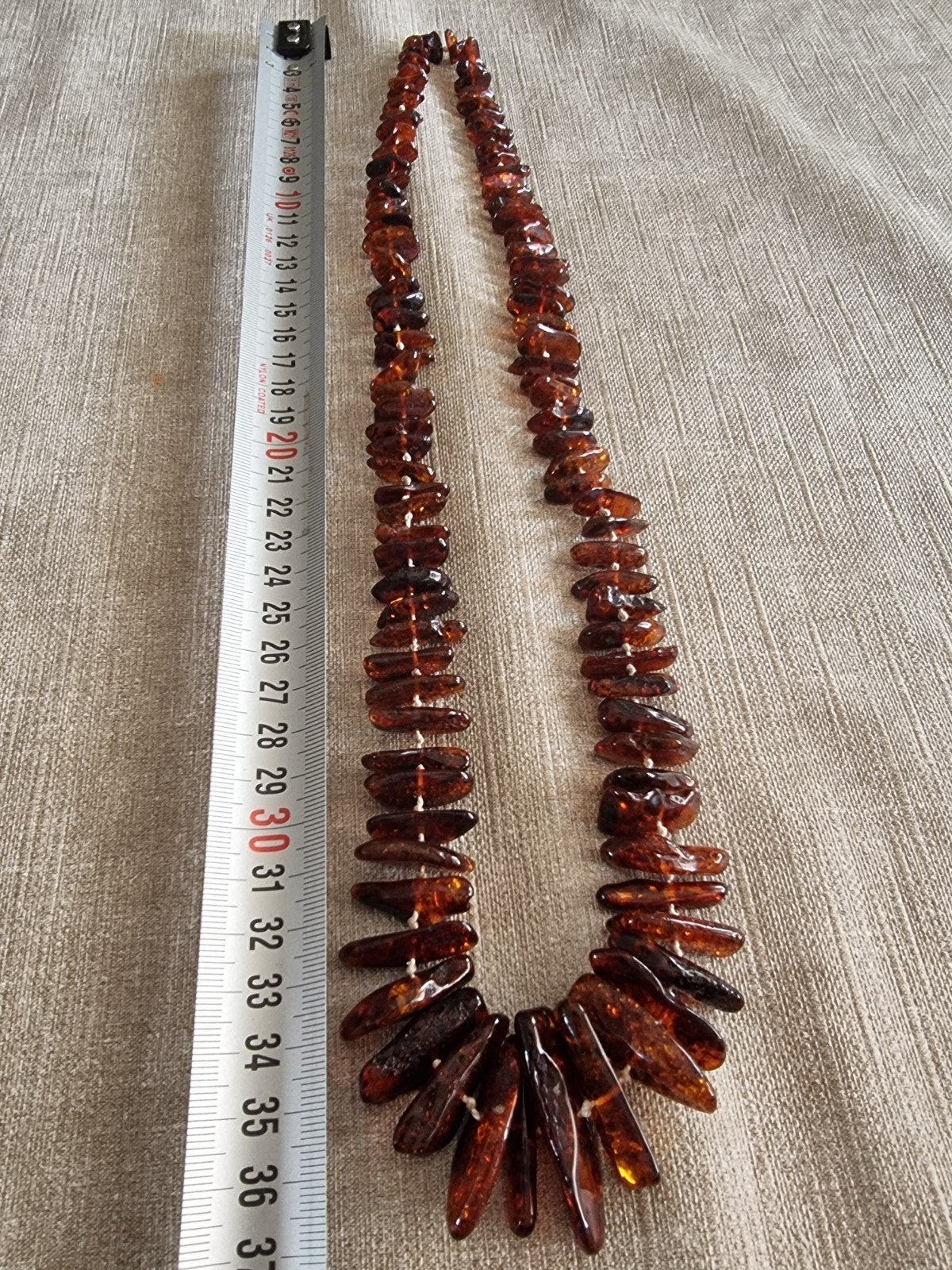 Lange ketting van Baltische barnsteen, Sieraden, Tassen en Uiterlijk, Kettingen, Ophalen of Verzenden, Zo goed als nieuw, Bruin