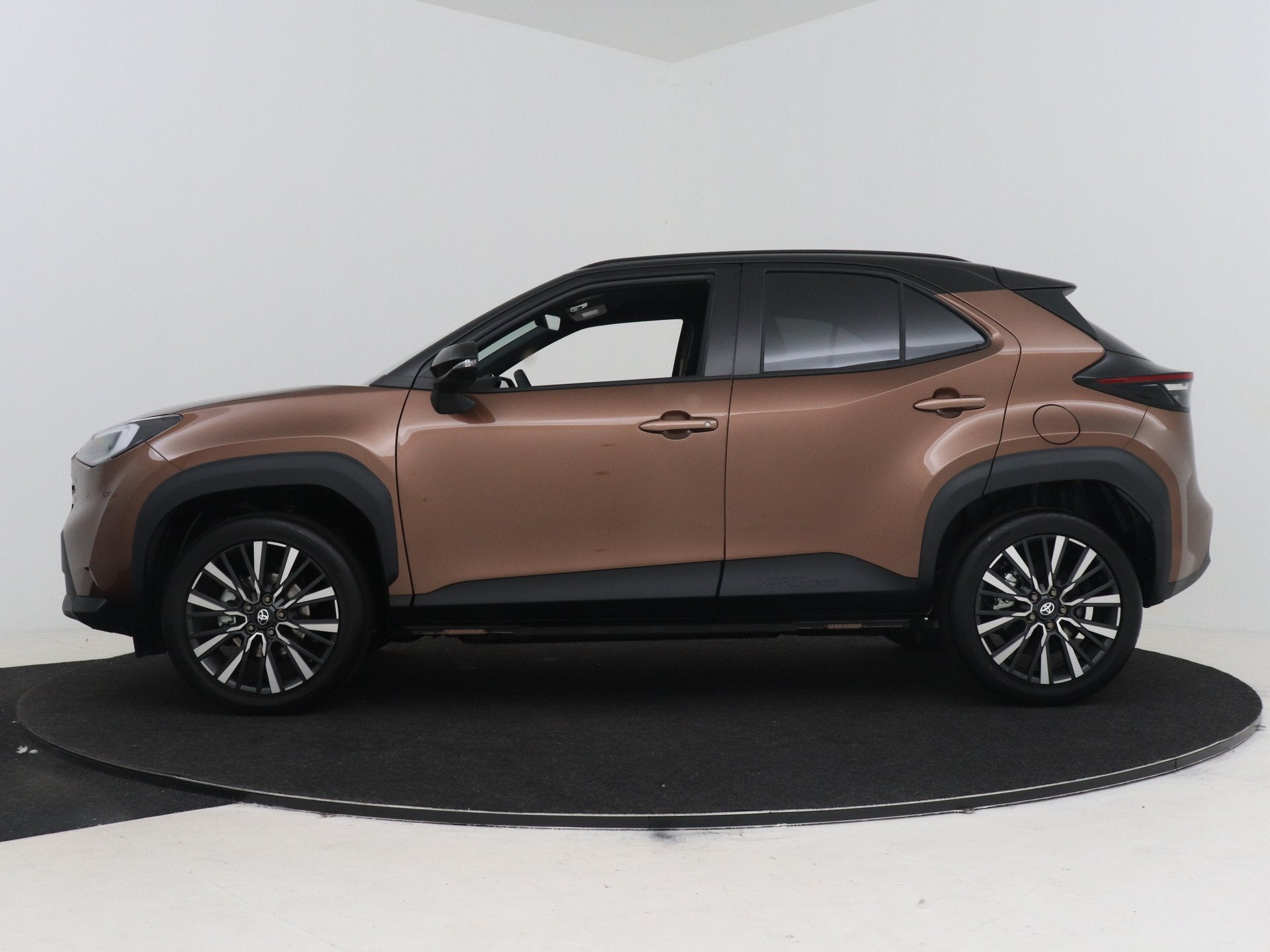 Toyota Yaris Cross 1.5 Hybrid 130 Executive Premium Pack, Auto's, 12 maanden, Overige kleuren, Leder en Stof, 1490 cc