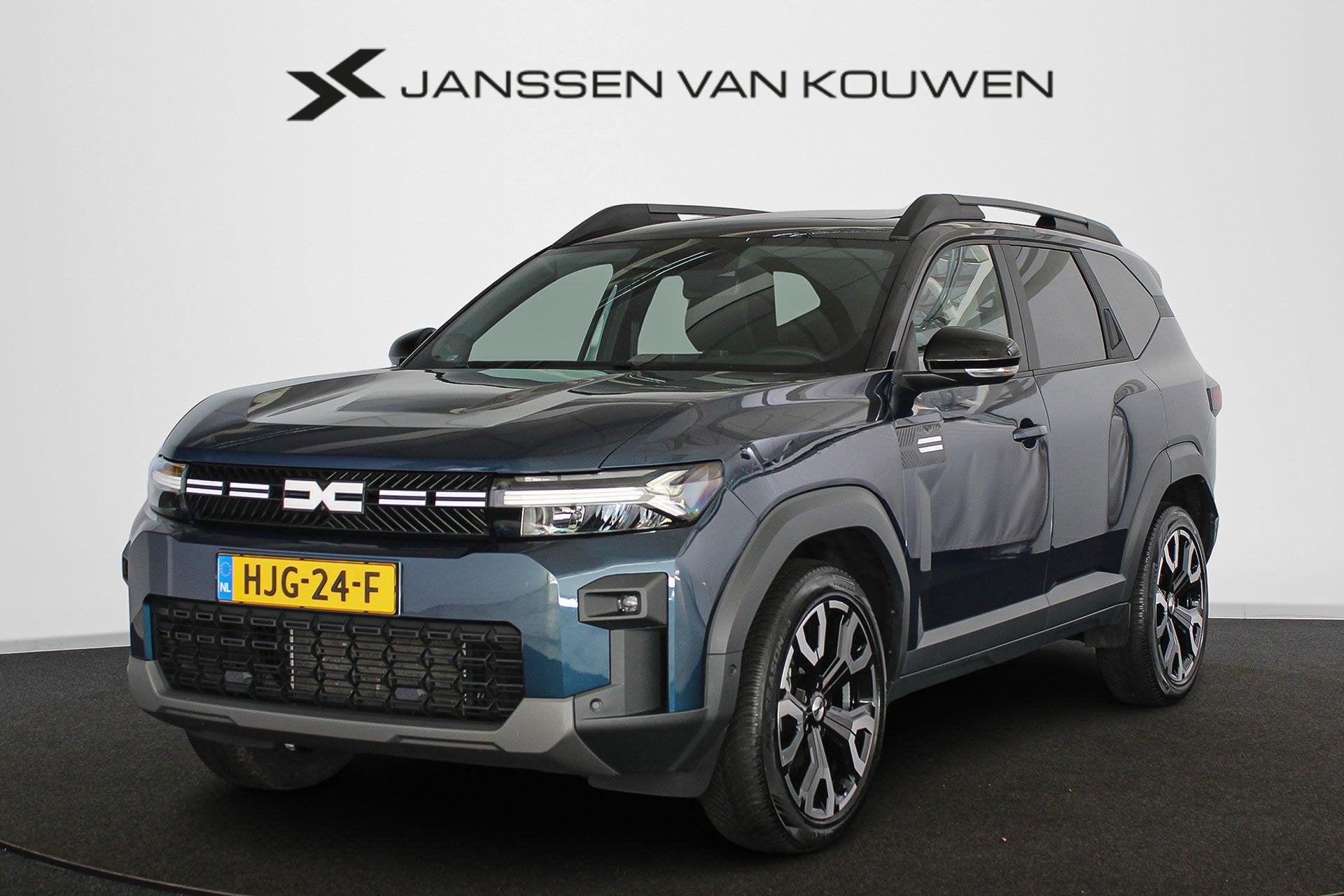 Dacia Bigster 1.8 Hybrid 155 Journey Panoramadak Stuur-Stoel, Auto's, Stof, Gebruikt, Blauw, Origineel Nederlands