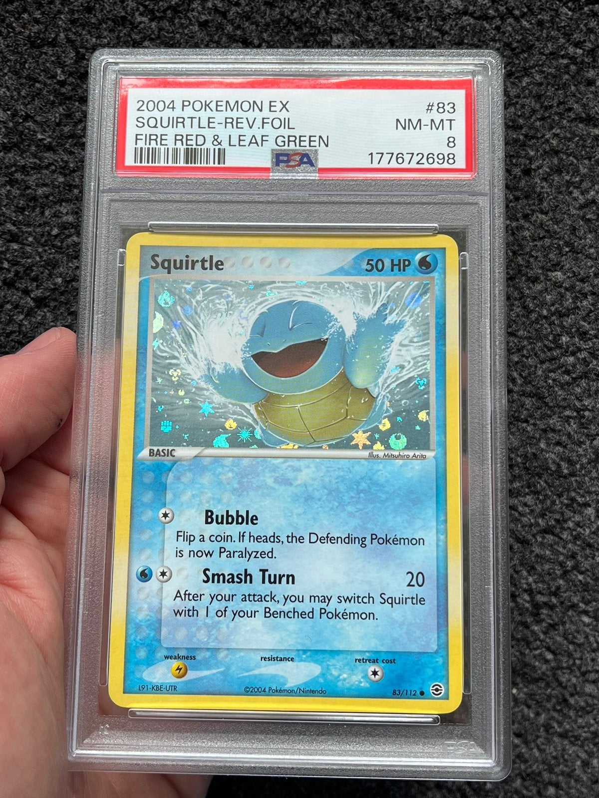 Pokémon PSA 8 Squirtle Rev. Holo #83 Fire red & Leaf green, Ophalen of Verzenden, Zo goed als nieuw, Losse kaart, Foil