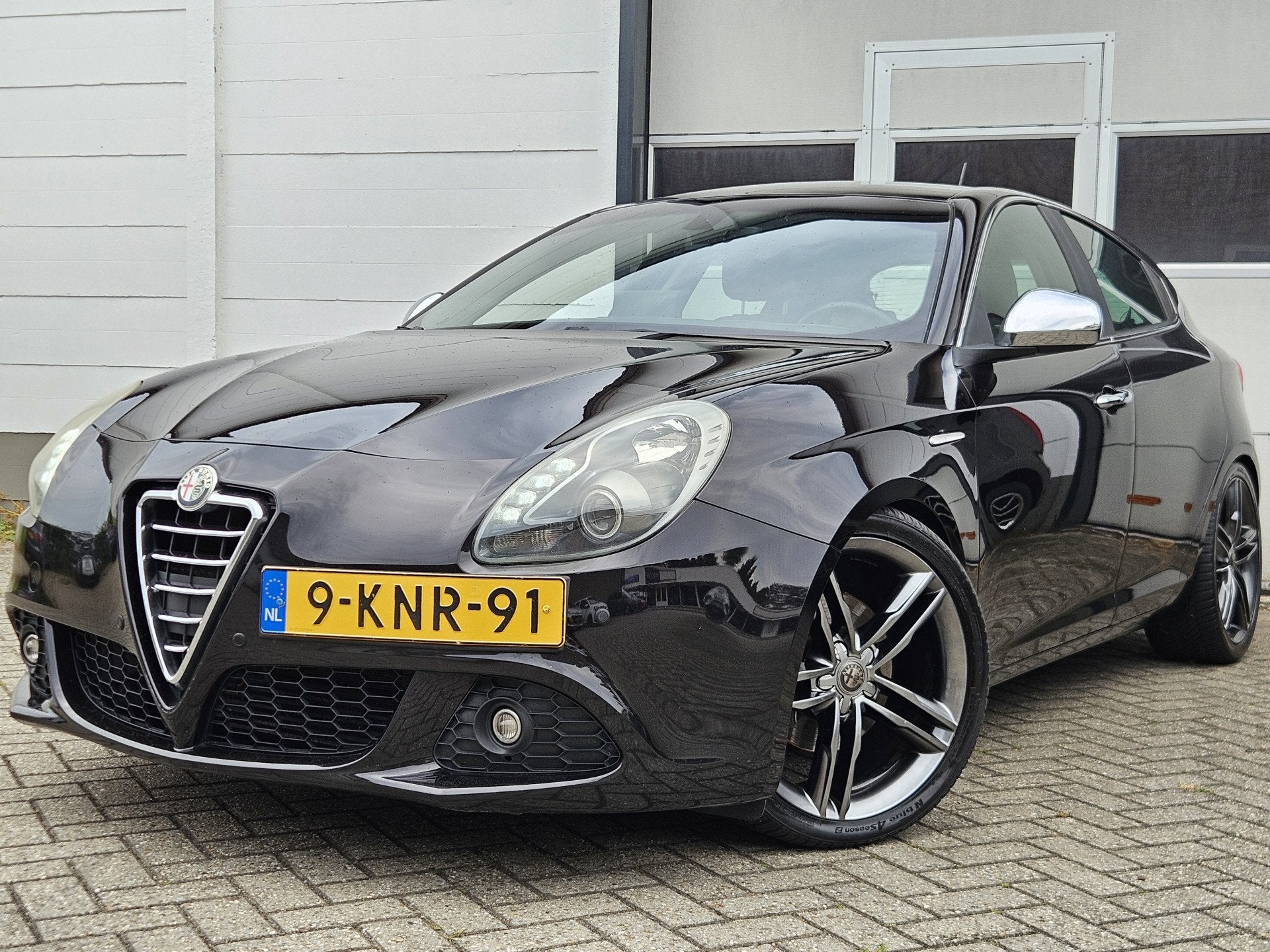 Alfa Romeo Giulietta 1.4 T Distinctive / Automaat / Leer / P, Auto's, Euro 5, 4 cilinders, Zwart, Bedrijf