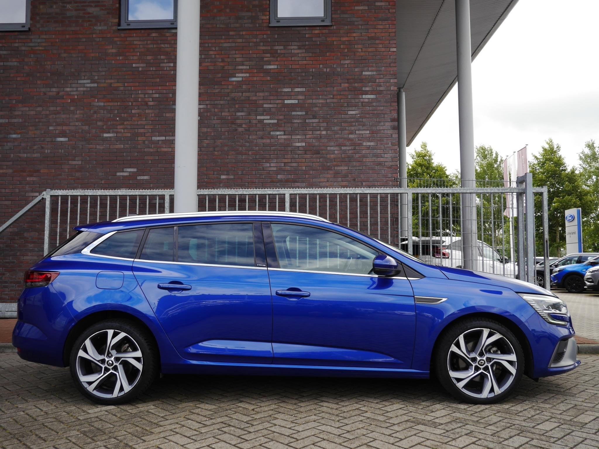 Renault Mégane Estate 1.6 E-Tech Plug-In Hybrid 160 R.S. Li, Auto's, Renault, Stof, Gebruikt, 4 cilinders, Blauw