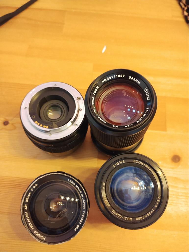 4 diverse cameralenzen: Sigma, Vivitar, Konica, Hanimex, Ophalen of Verzenden, Gebruikt, Standaardlens, Zoom