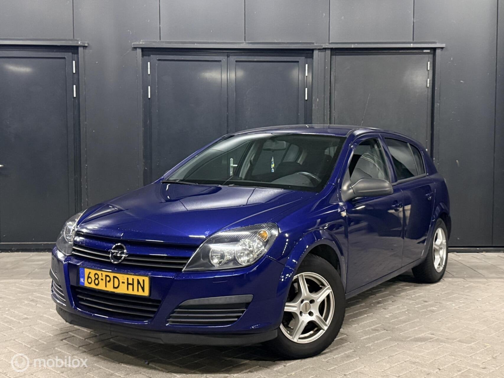 Opel Astra 1.6 Essentia AUT/carplay/trekhaak/airco/cruise, Auto's, 15 km/l, Gebruikt, 4 cilinders, Blauw