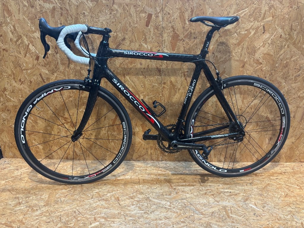 Carbon racefiets. Sirocco. Campagnolo Record, 28 inch, Gebruikt, Carbon, Velgrem
