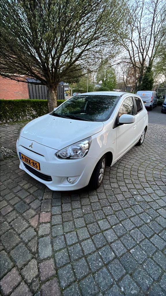 Mitsubishi Space Star 1.0 MPI 2015 Wit met nieuwe motor., Auto's, Voorwielaandrijving, Stof, Wit, Origineel Nederlands