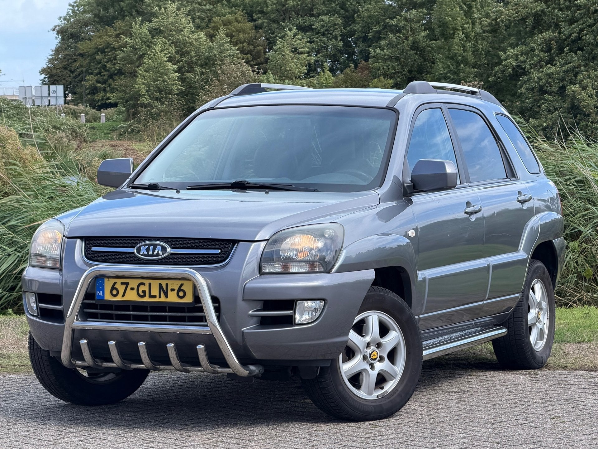 Kia Sportage 2.0 CVVT X-cite - Grayish Silver - LPG G3 - 89c, Auto's, 1486 kg, Gebruikt, Zwart, 4 cilinders