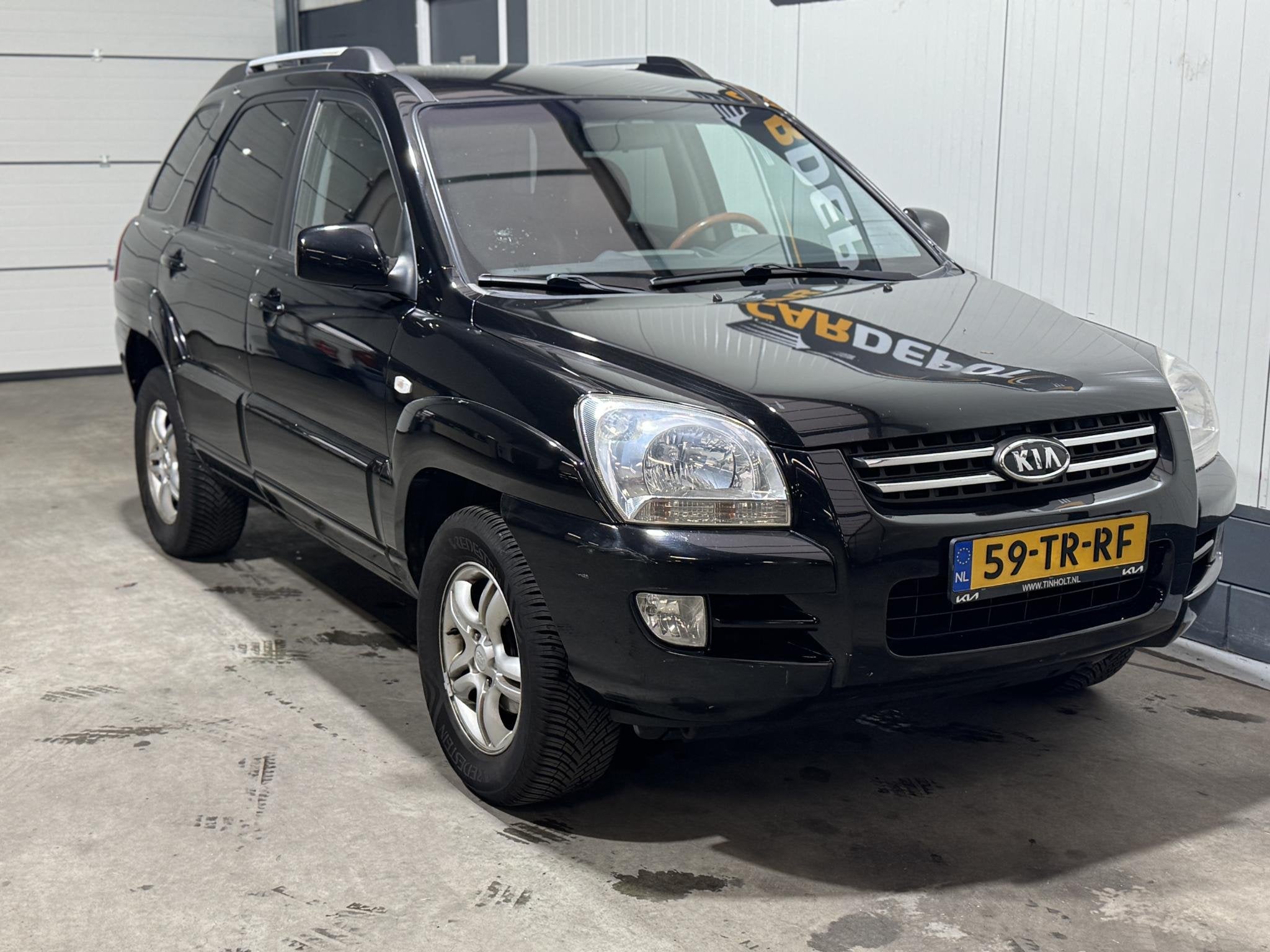Kia Sportage 2.0 CVVT M-bition, Auto's, 1442 kg, Gebruikt, 4 cilinders, Leder en Stof