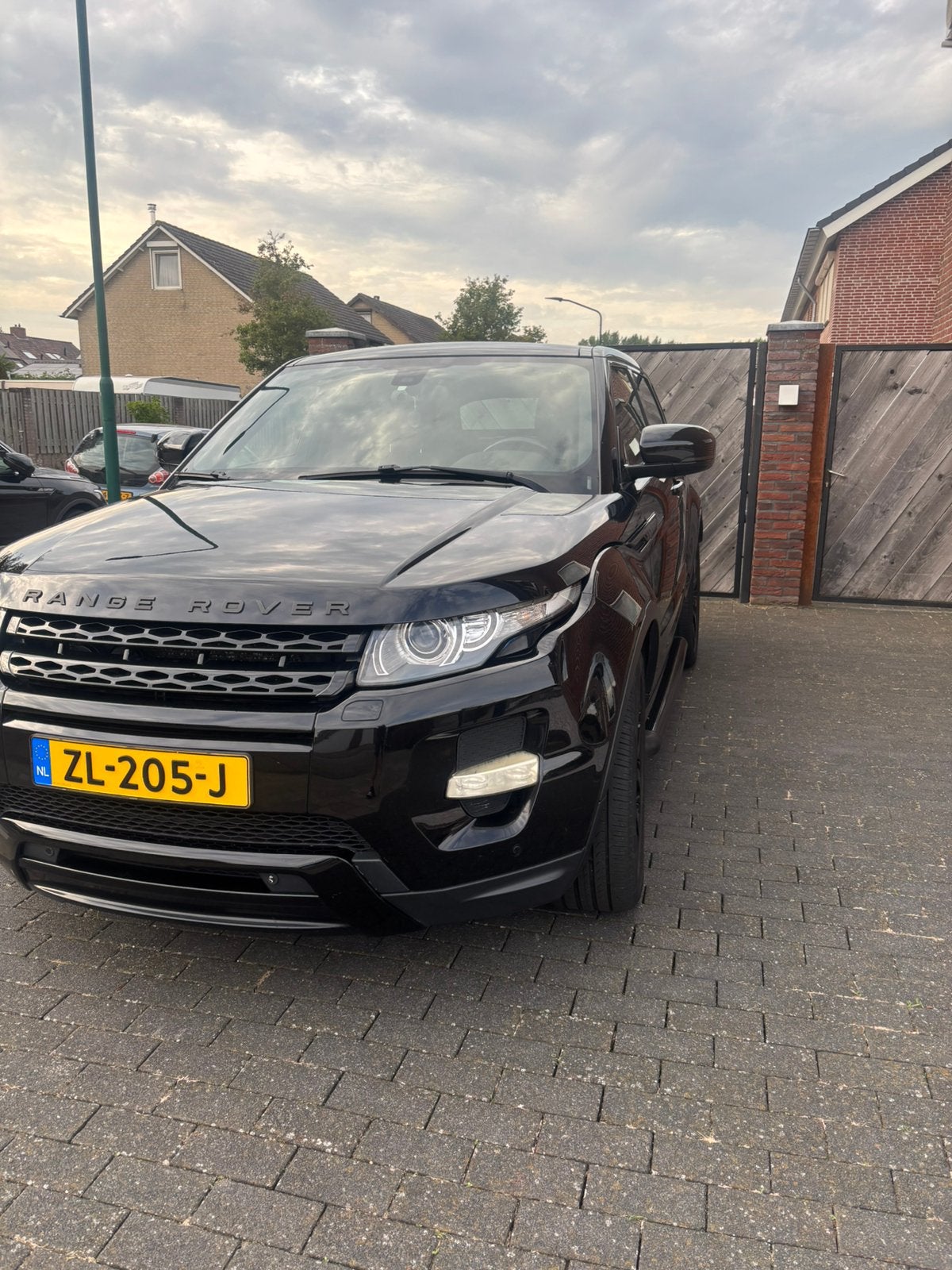 Land Rover Range Rover Evoque 2.2 SD4 190pk 4WD 2012 Zwart, Auto's, Automaat, Euro 5, 15 km/l, 1800 kg