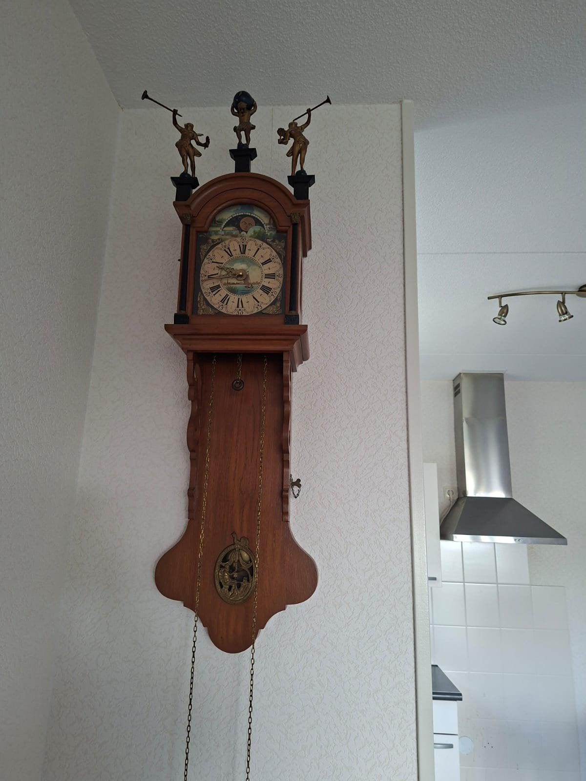 Friese staatklok incl folder, Ophalen