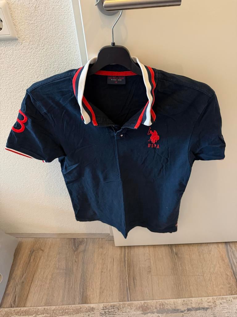 USPA polo shirt donkerblauw met rood en wit M size, Ophalen of Verzenden, Gedragen, Overige maten, Blauw