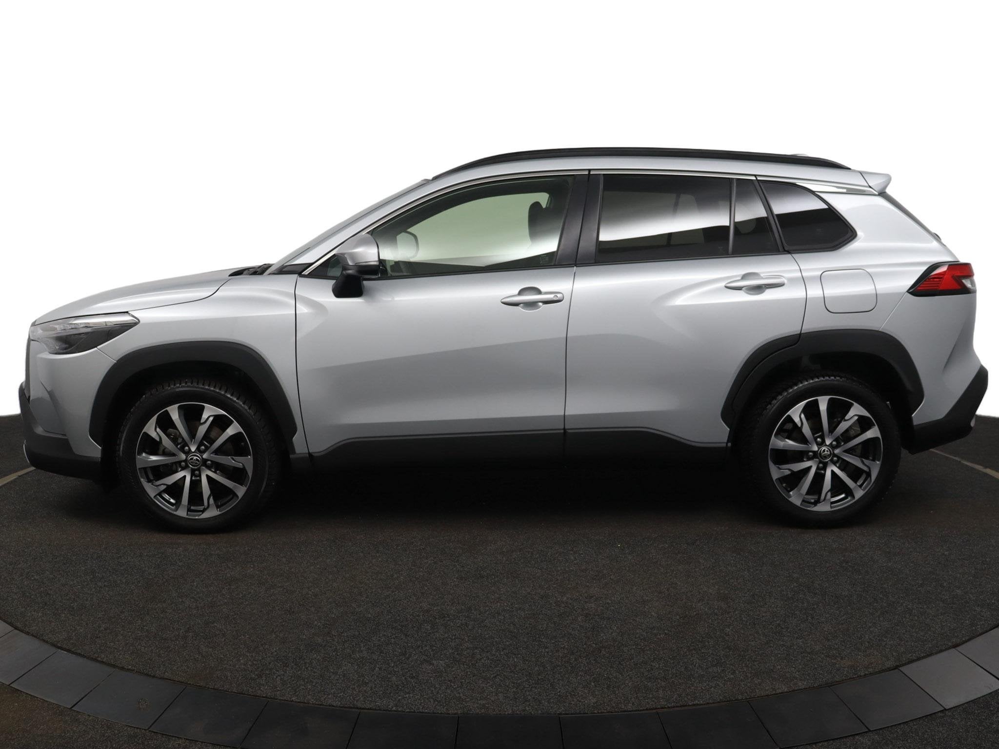Toyota Corolla Cross Hybrid 140 Style | Elektrisch bedienbar, Auto's, Stof, Gebruikt, 4 cilinders, Parkeersensor