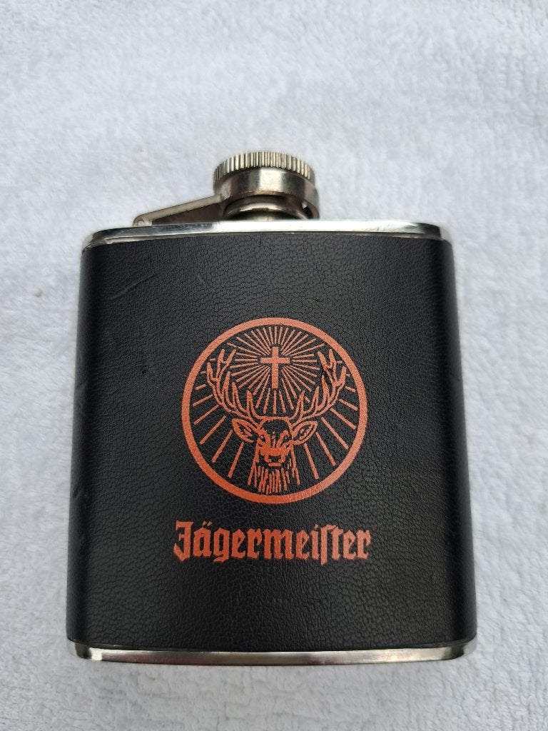 Jägermeister heupfles - RVS met leren omhulsel, Verzamelen, Merken en Reclamevoorwerpen, Ophalen of Verzenden, Gebruikt, Gebruiksvoorwerp