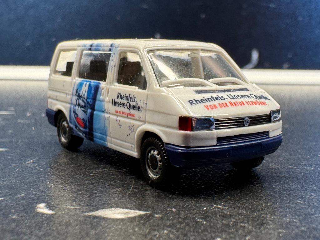 Markt-3289: VW Caravelle - Rheinfels Quelle, Ophalen of Verzenden, Nieuw, Bus of Vrachtwagen, Herpa